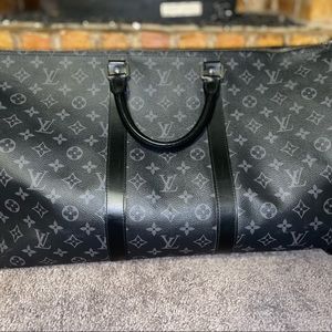 Louis Vuitton monogramed weekender bag. Used in like new condition.